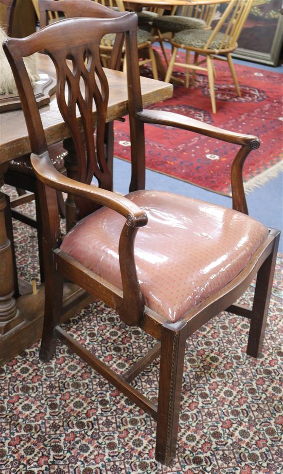 A set of seven Chippendale style dining chairs